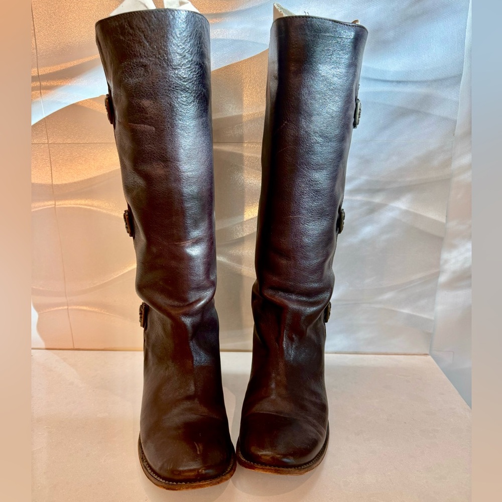 Frye “Shirley” riding boots in chocolate brown.